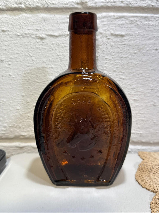 Vintage Wheaton Amber/Brown Glass Horse Shoe Medicine Co Bitters Bottle 7 1/2"